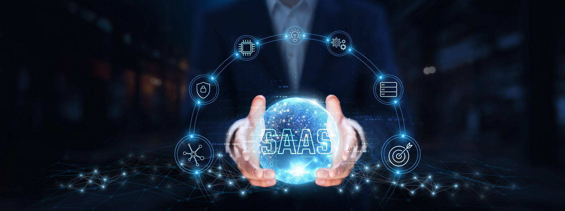 SaaS: Businessman hands hold global SaaS technology, cloud computing, subscription model, scalability, data security, integration, user accessibility, cost efficiency.